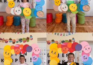 Dzieci trzymaja ramkę z okazji Dnia Kropki