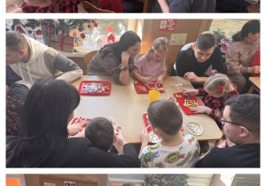 Dzieci wraz z rodzicami własnoręcznie malują ozdoby świąteczne